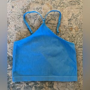 NWOT- blue sports bra or crop top with halter front. XL adjustable straps